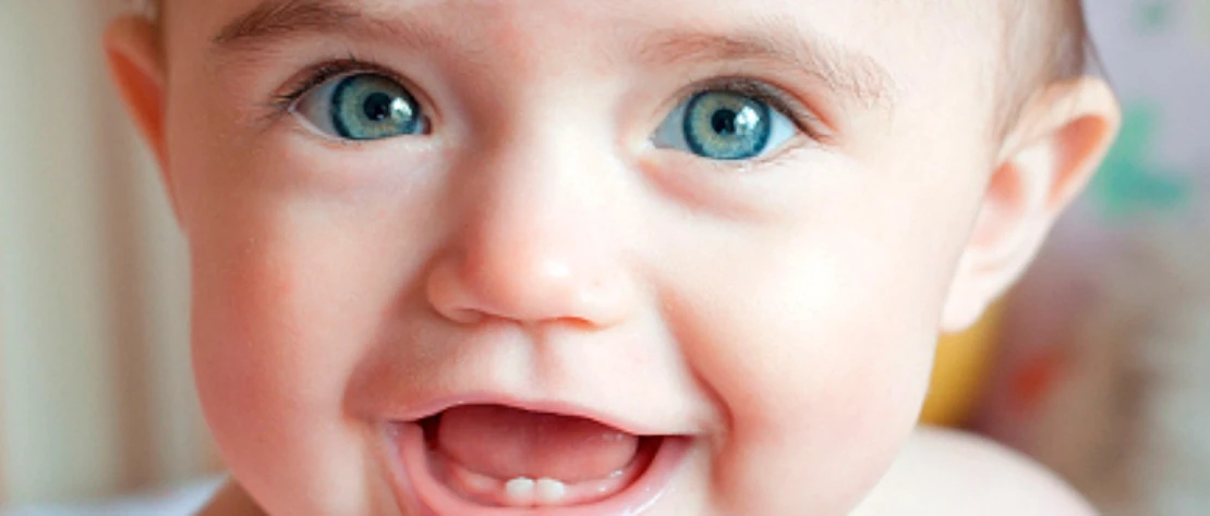 picture of a baby with baby teeth