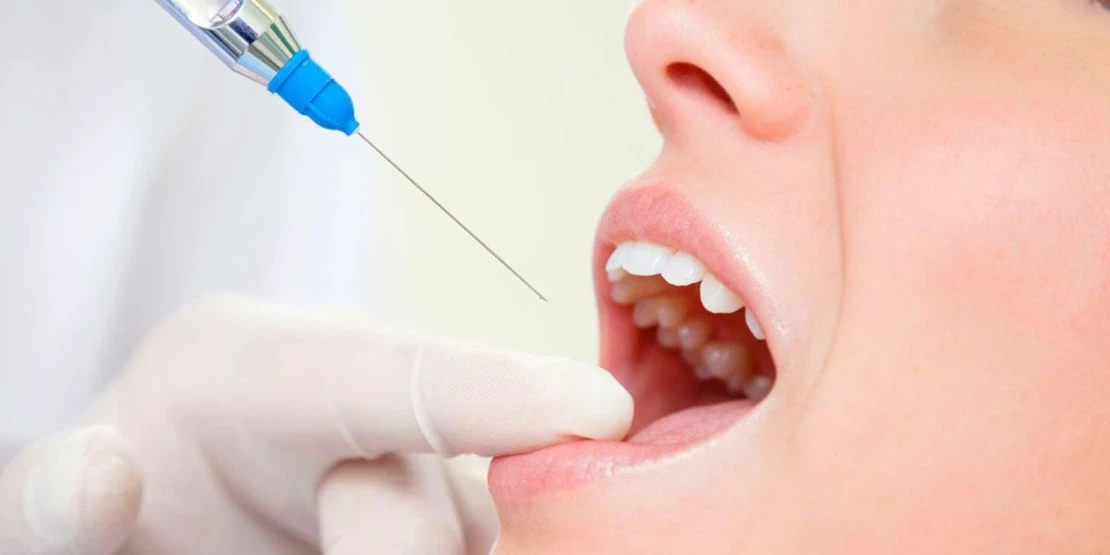photo of anesthesia shot for dental treatment