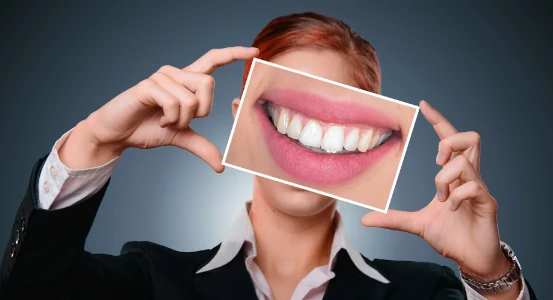 photo of a girl after dental implantation in Cherkassy dental clinic